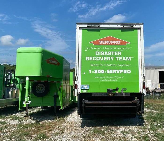 a green SERVPRO truck